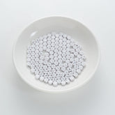 BD00103-01-silver-letter-white-opaque-coin-alphabet-beads-single-t-4×7mm